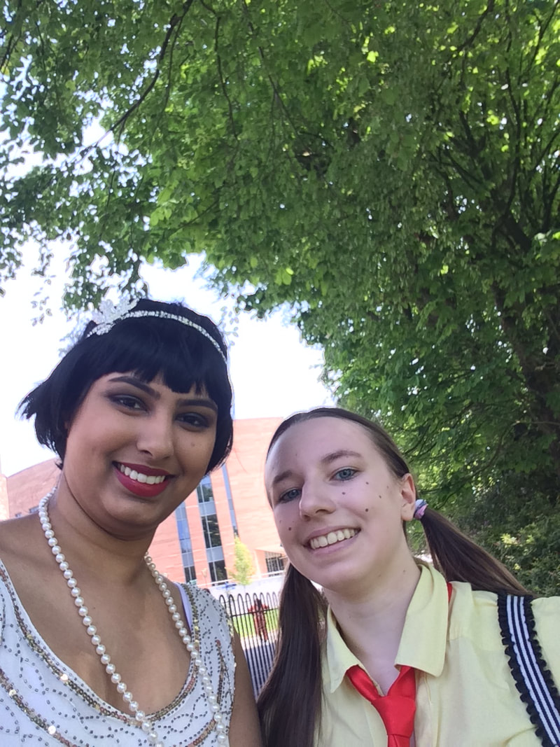 A selfie of Subhi and Louis as teenagers. Subhi is dressed as a flapper and Louis as Spongebob.